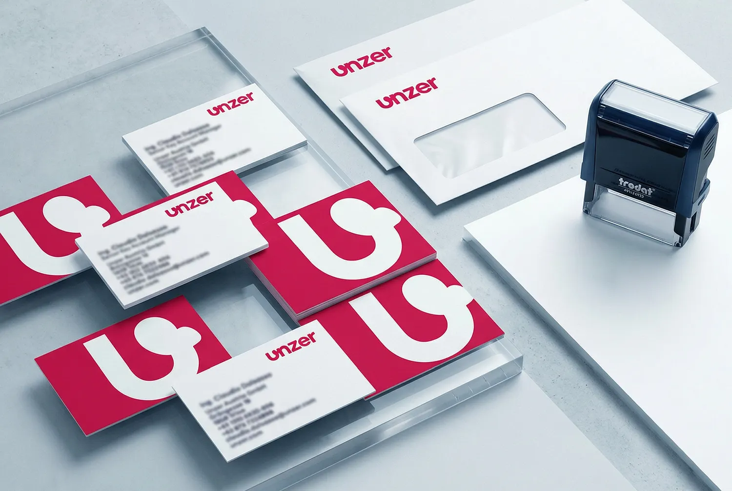 Individuelle Geschäftsdrucksorten für Unzer Austria: Grafikdesign und Druckmanagement von der Werbeagentur infinite Österreich.